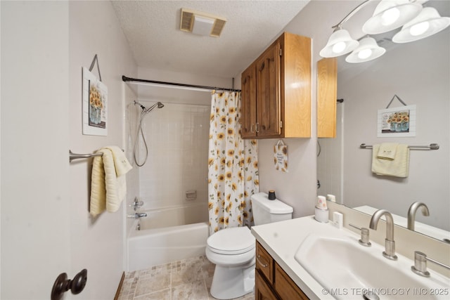 bathroom with vanity, visible vents, a textured ceiling, toilet, and shower / tub combo with curtain