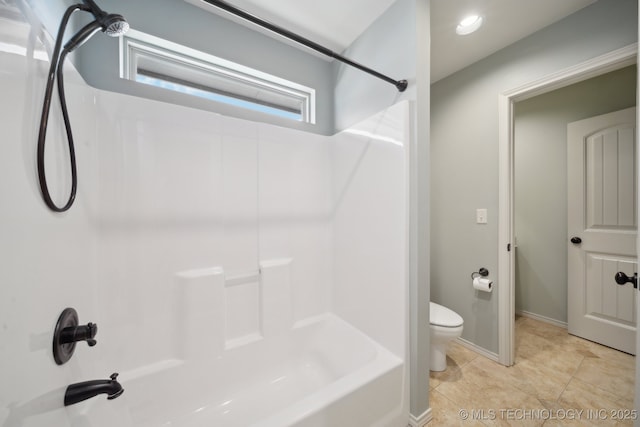 bathroom with  shower combination, tile patterned flooring, toilet, and baseboards