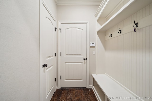 mudroom with dark wood-style floors and ornamental molding