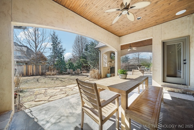 view of patio / terrace featuring ceiling fan, outdoor dining area, and a fenced backyard