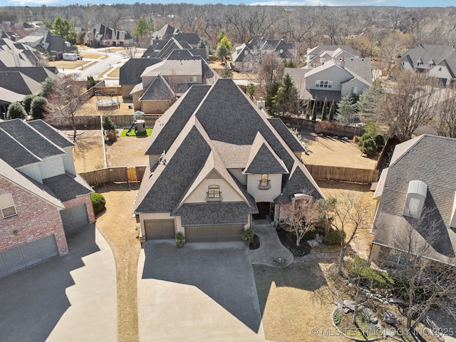 drone / aerial view with a residential view