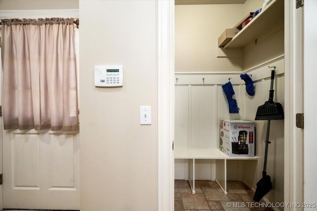 mudroom featuring stone tile flooring