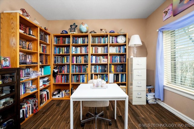 office with a wealth of natural light, wood finish floors, and baseboards