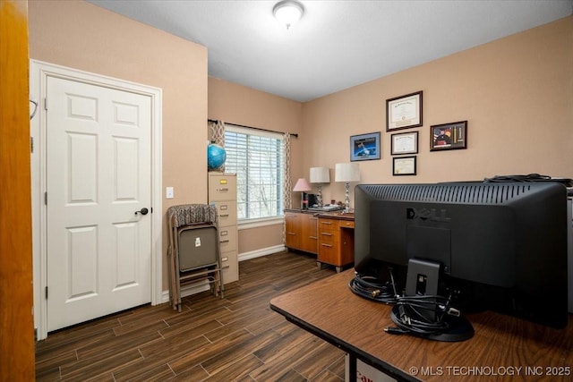 office area featuring wood finish floors and baseboards