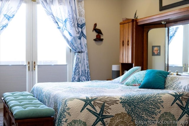 bedroom featuring french doors