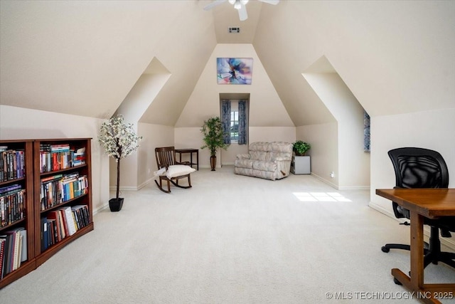 living area featuring visible vents, a ceiling fan, carpet flooring, vaulted ceiling, and baseboards