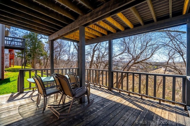 deck featuring a yard