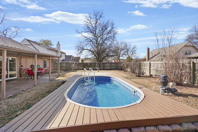 view of pool with a fenced backyard and a fenced in pool