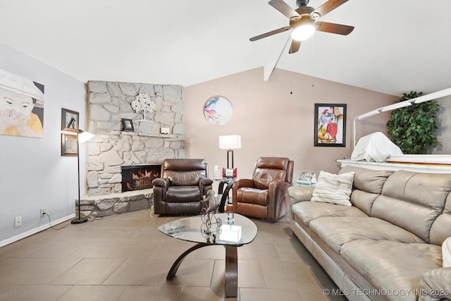 tiled living area featuring a stone fireplace, lofted ceiling with beams, baseboards, and ceiling fan