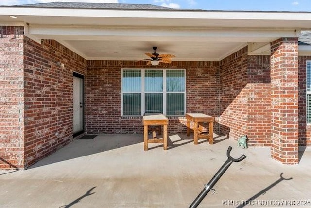 view of patio / terrace featuring ceiling fan