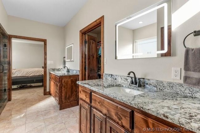 bathroom with two vanities and a sink