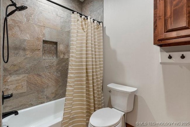 bathroom featuring toilet and shower / tub combo with curtain