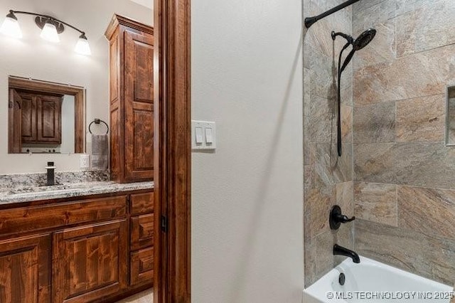 full bathroom featuring vanity and shower / bathing tub combination