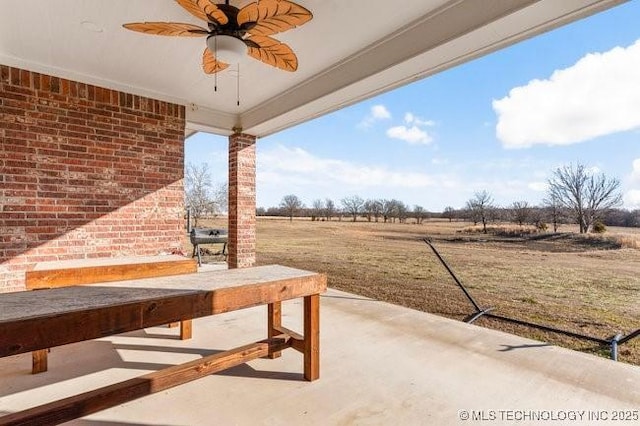 view of patio with a ceiling fan