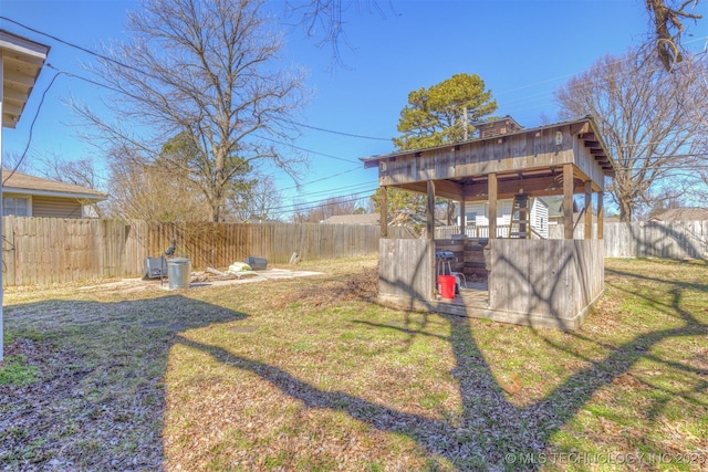 view of yard with a fenced backyard