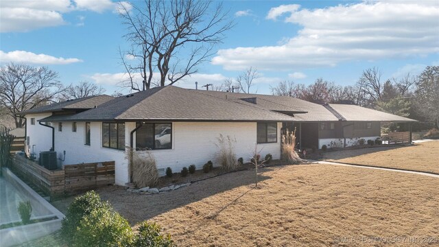 2808 E 37th Pl, Tulsa, OK 74105 - view of front of property with brick siding and roof with shingles