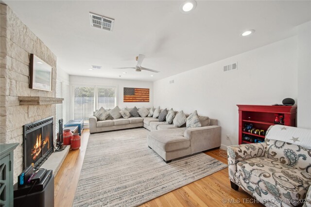 2808 E 37th Pl, Tulsa, OK 74105 - living area with a fireplace, ceiling fan, wood finished floors, and recessed lighting