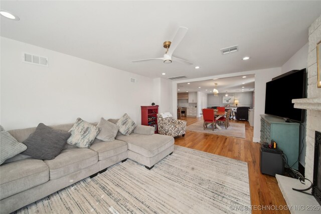 2808 E 37th Pl, Tulsa, OK 74105 - living area with light wood-style flooring, recessed lighting, and a ceiling fan
