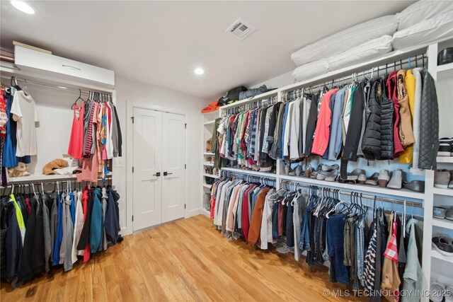 2808 E 37th Pl, Tulsa, OK 74105 - spacious closet featuring wood finished floors