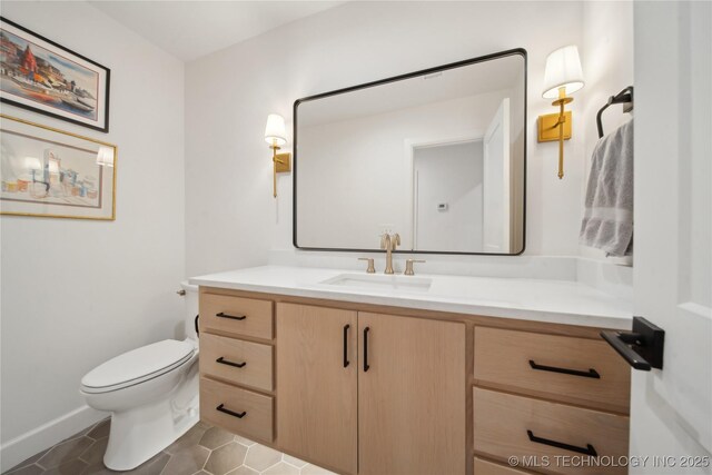 2808 E 37th Pl, Tulsa, OK 74105 - half bathroom featuring vanity and tile patterned flooring