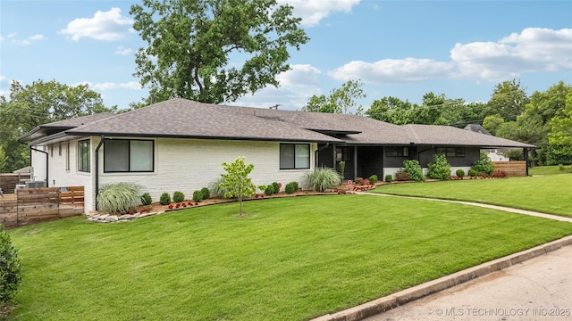 2808 E 37th Pl, Tulsa, OK 74105 - ranch-style house featuring a front lawn, brick siding, and roof with shingles