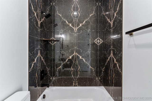 full bathroom featuring washtub / shower combination and toilet