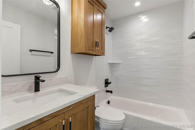 full bathroom featuring toilet, shower / washtub combination, and vanity