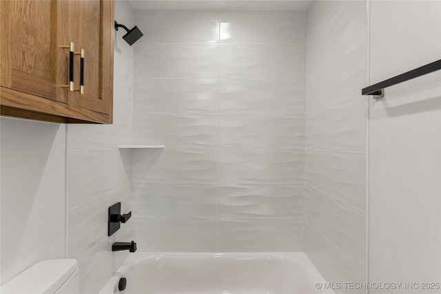 full bathroom featuring toilet and  shower combination