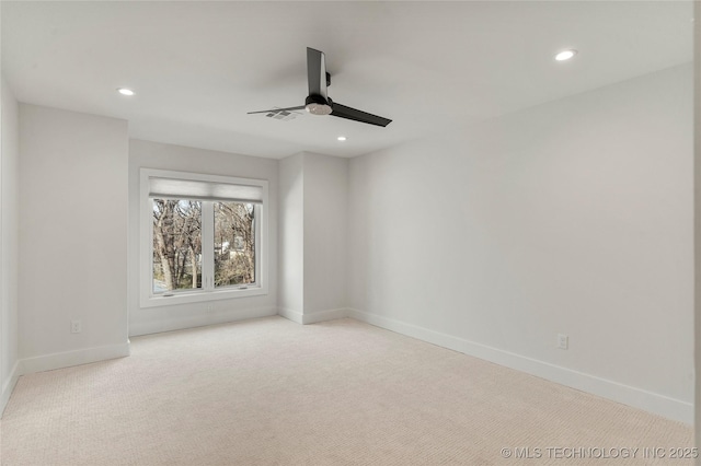 empty room featuring recessed lighting, visible vents, a ceiling fan, carpet flooring, and baseboards