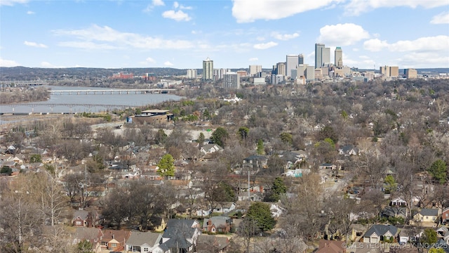 aerial view featuring a city view and a water view