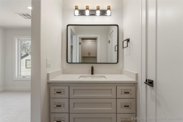 bathroom featuring visible vents and vanity