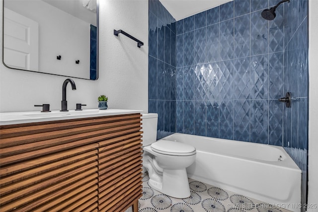 bathroom with vanity, toilet, tub / shower combination, and tile patterned flooring