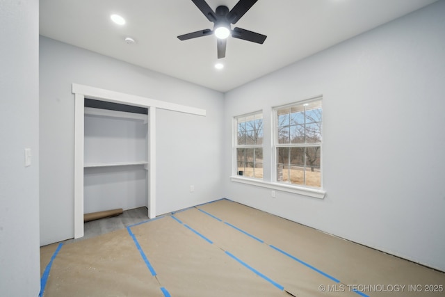 unfurnished bedroom with recessed lighting, a closet, and a ceiling fan