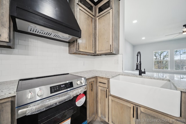 7890 N Oak Dr, Beggs, OK 74421 - kitchen featuring a ceiling fan, under cabinet range hood, stainless steel electric range oven, a sink, and backsplash