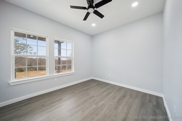 7890 N Oak Dr, Beggs, OK 74421 - spare room featuring recessed lighting, baseboards, a ceiling fan, and wood finished floors