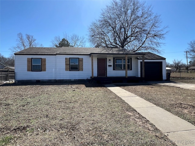 single story home with a shingled roof, a porch, concrete driveway, fence, and a garage