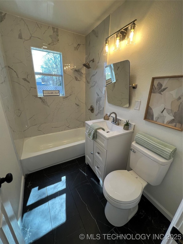 full bathroom featuring marble finish floor, shower / washtub combination, vanity, and toilet