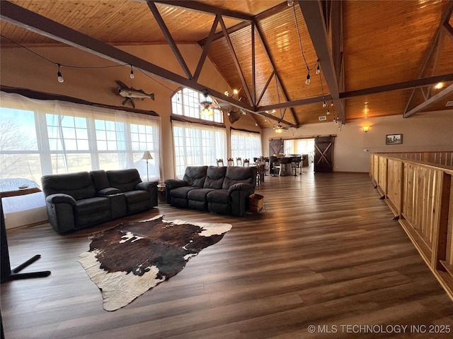 living room featuring beamed ceiling, wood finished floors, and wood ceiling