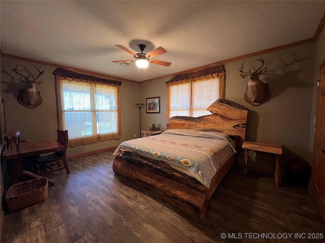 bedroom with multiple windows, wood finished floors, and crown molding