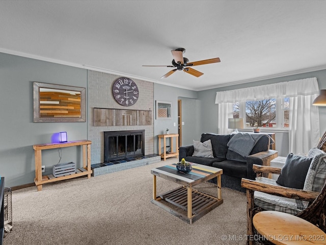 carpeted living area featuring ceiling fan, ornamental molding, a fireplace, and baseboards