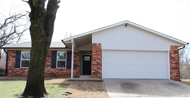 single story home featuring a garage, roof with shingles, concrete driveway, and brick siding