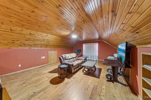 additional living space featuring wood ceiling, wood-type flooring, vaulted ceiling, and baseboards