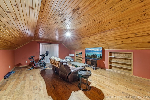 interior space featuring built in shelves, wooden ceiling, baseboards, vaulted ceiling, and hardwood / wood-style floors