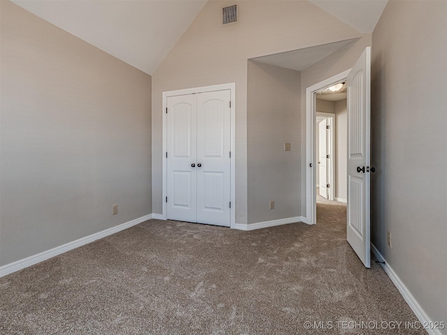 unfurnished bedroom with a closet, visible vents, baseboards, and carpet