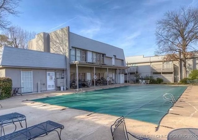 community pool featuring a patio