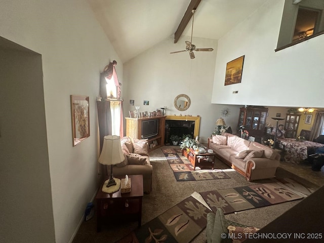 living area with ceiling fan, high vaulted ceiling, a fireplace, and beam ceiling