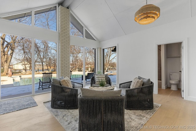 view of patio / terrace with an outdoor hangout area, a lanai, and an outdoor pool