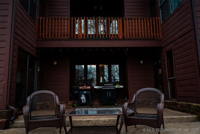 view of patio / terrace with a balcony