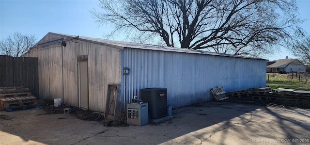 view of outbuilding with an outbuilding and central air condition unit