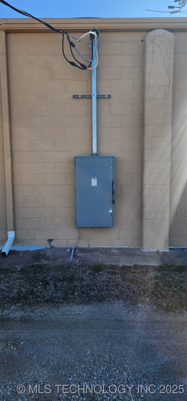 exterior details featuring concrete block siding